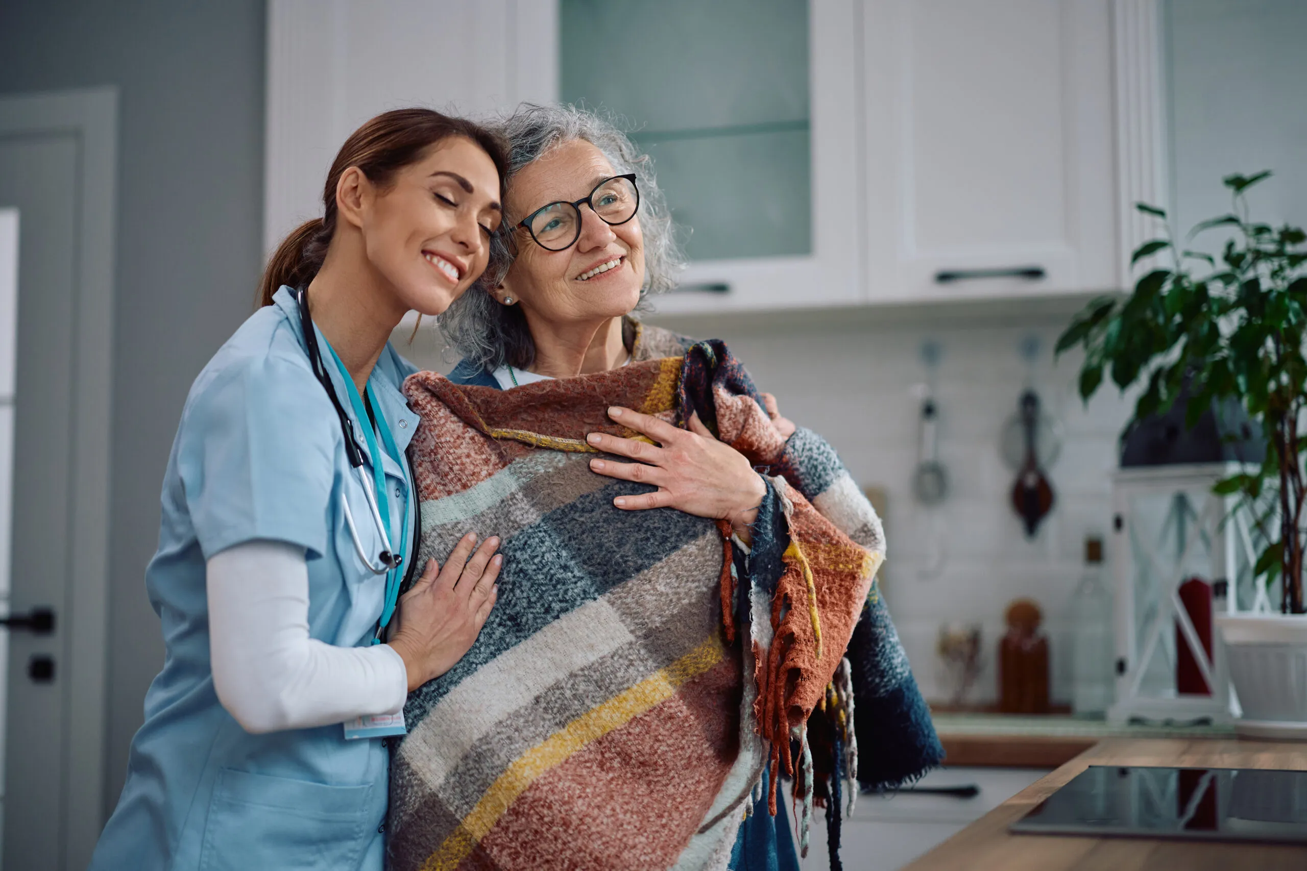 home care nurse and senior at home hugging Taunton MA service areas home health care