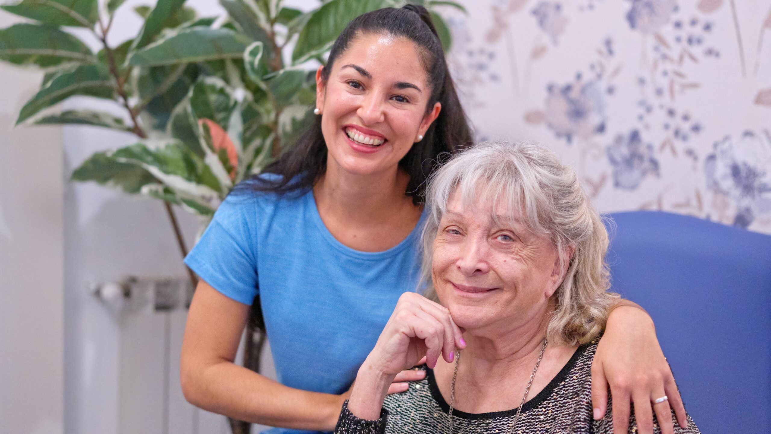 home health care New Bedford MA caregiver hugging elderly woman home health care New Bedford MA caregiver hugging elderly woman